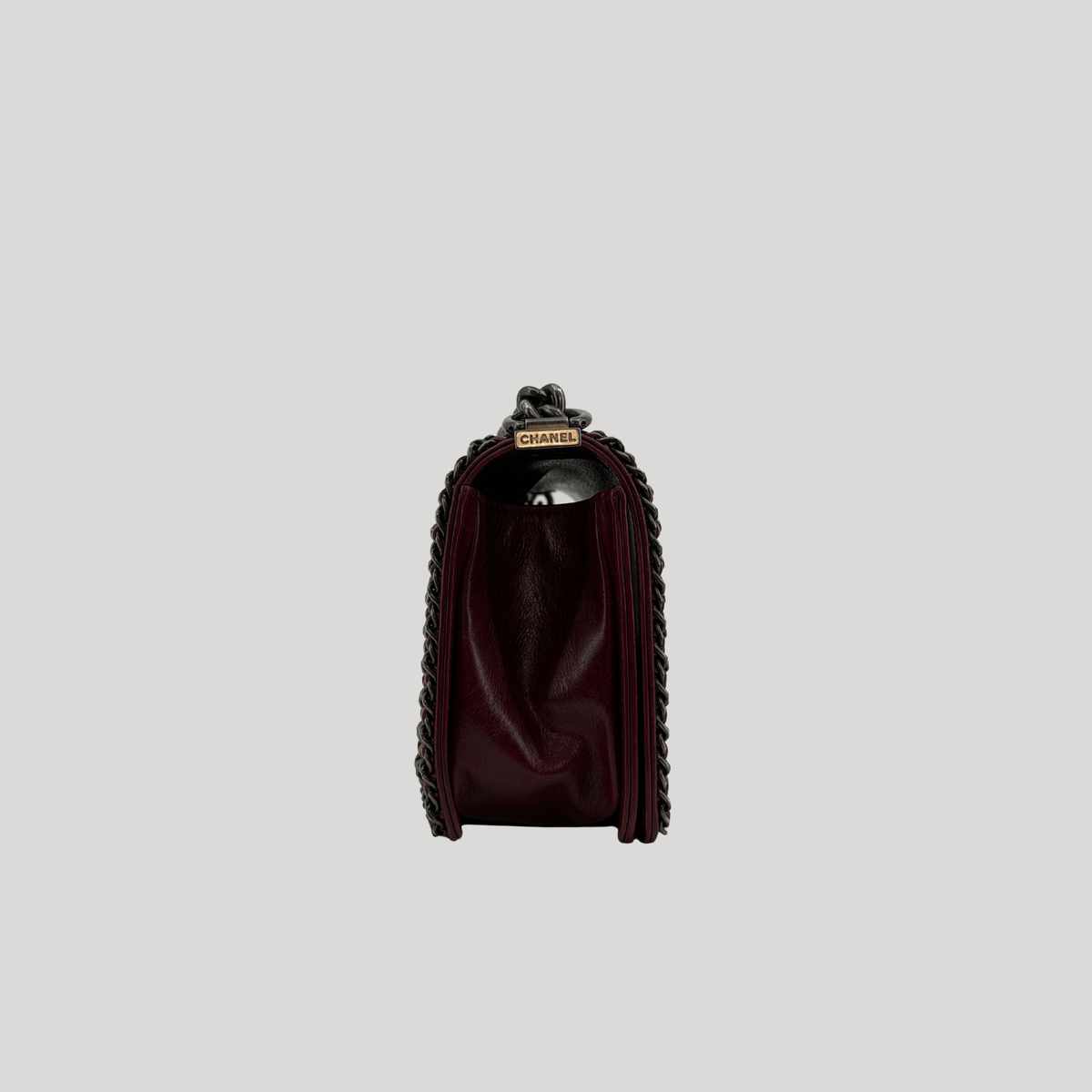 CHANEL Chained Boy Flap Old Medium Burgundy Glazed Calfskin Aged Gunmetal Hardware | Randolph Goods