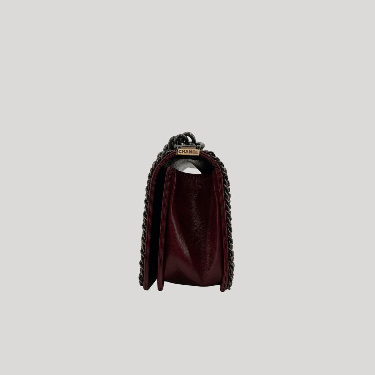 CHANEL Chained Boy Flap Old Medium Burgundy Glazed Calfskin Aged Gunmetal Hardware | Randolph Goods
