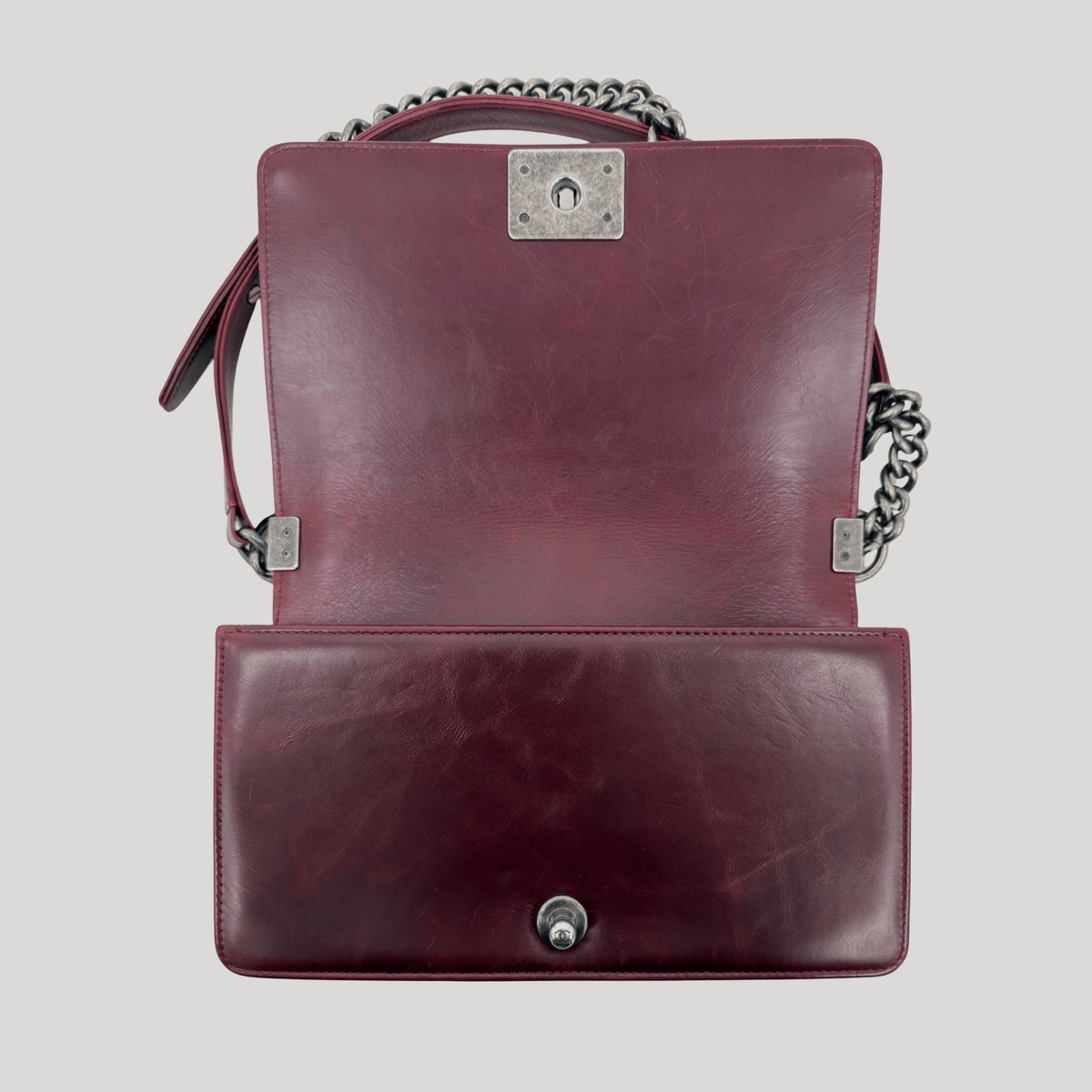 CHANEL Chained Boy Flap Old Medium Burgundy Glazed Calfskin Aged Gunmetal Hardware | Randolph Goods