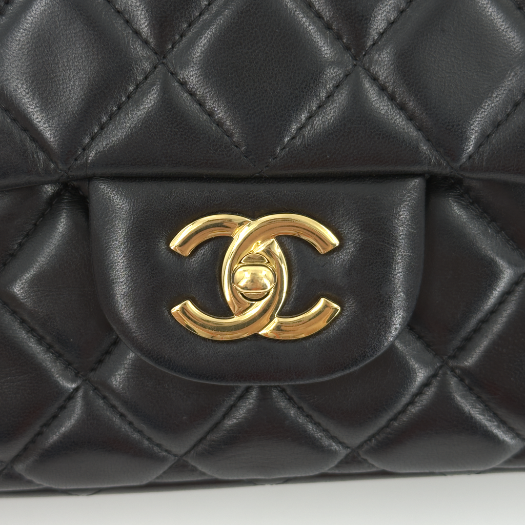 Chanel Classic Flap Maxi Black Lambskin Gold Hardware