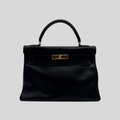 Hermès Kelly 32 Noir Gulliver Leather Gold Hardware