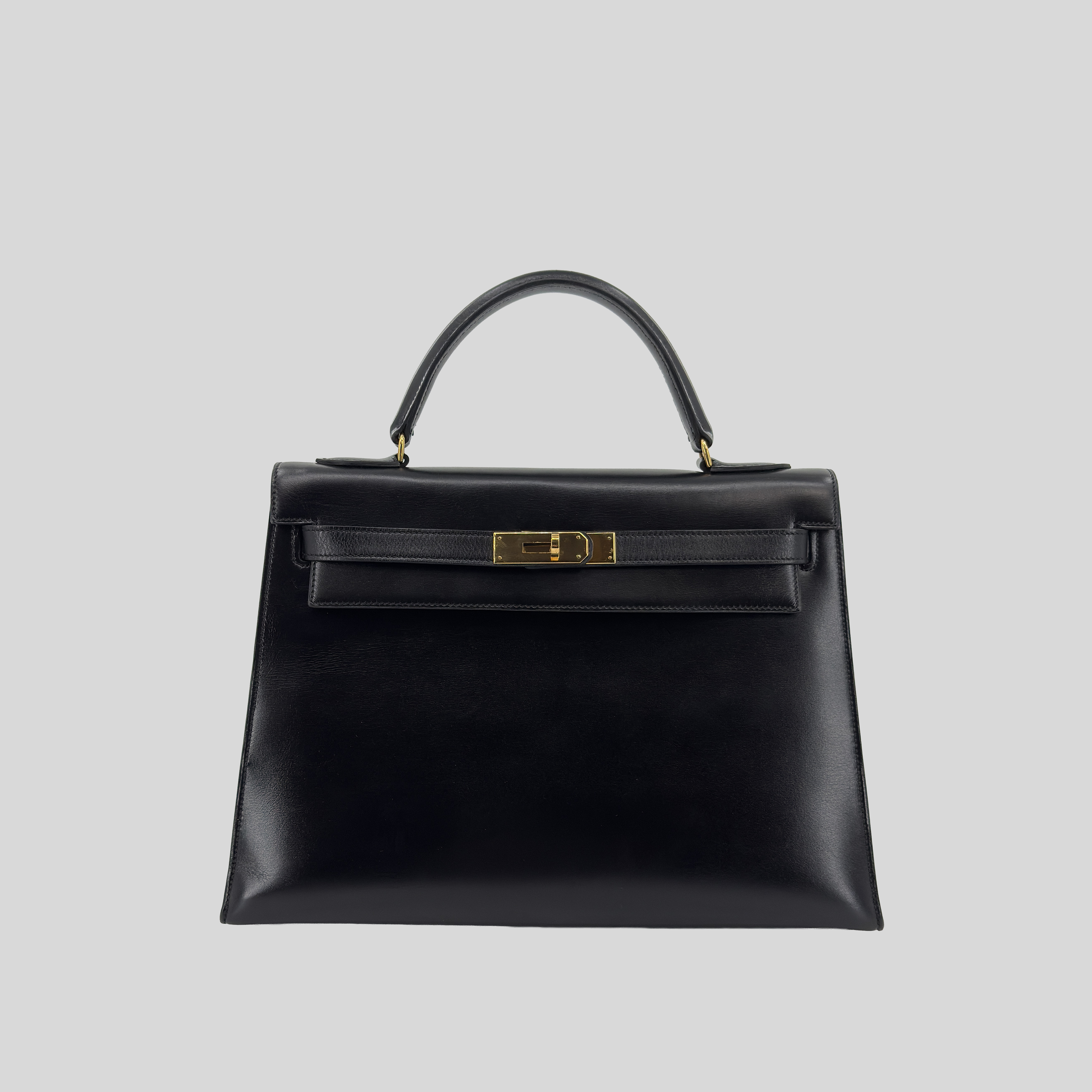 Hermès Kelly 32 Noir Box Leather Gold Hardware