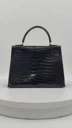 Hermès Kelly 28 Black Porosus Crocodile Leather Gold Hardware